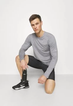 Mizuno IMPULSE CORE MID - Tights - Black -Mizuno 8b9c7979394140309767e10f3ea1ba34